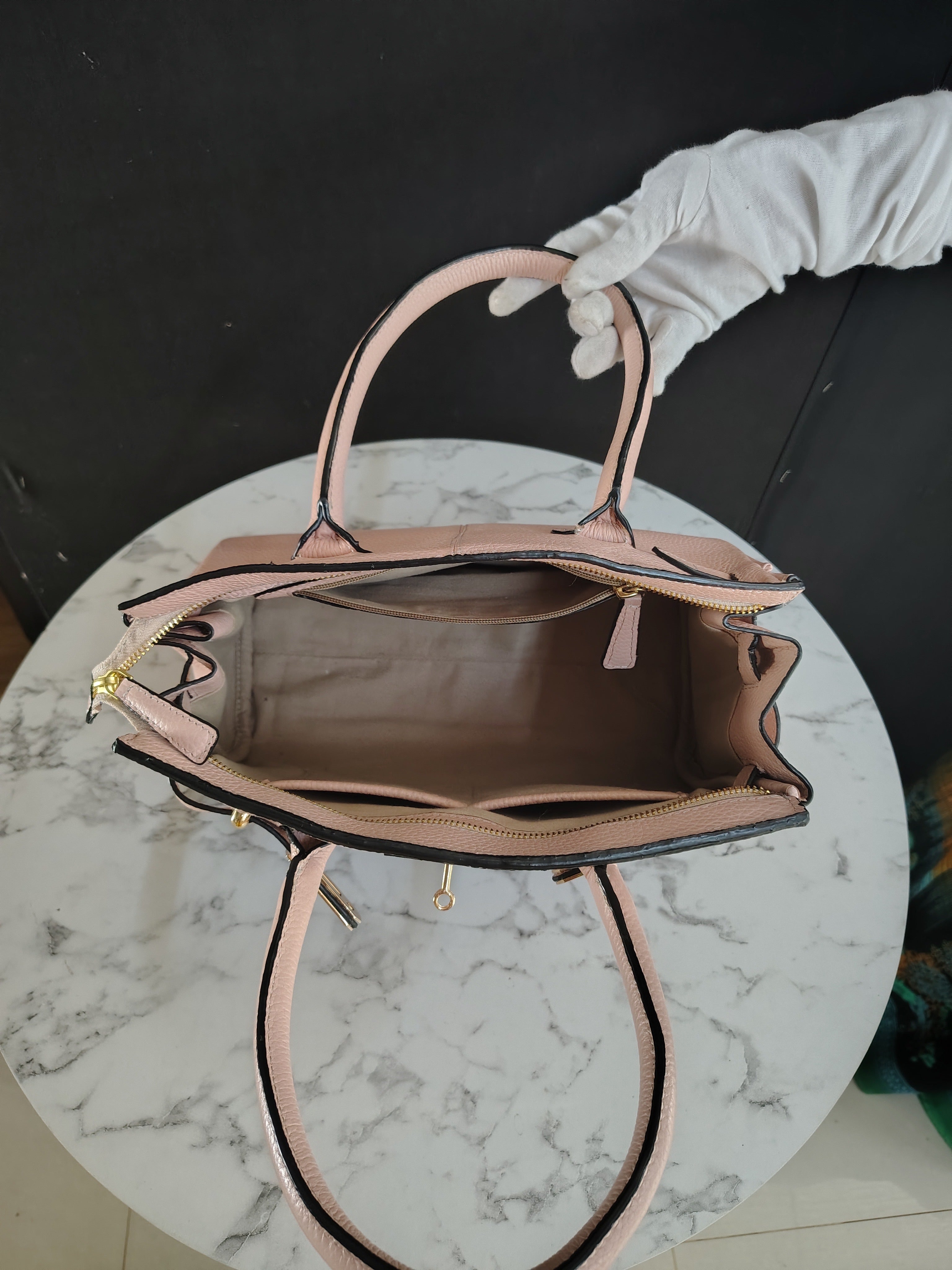 Riya Printed leather handbag