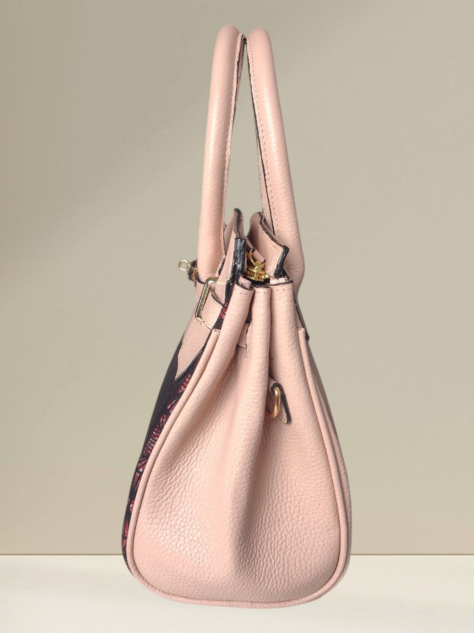 Riya Printed leather handbag