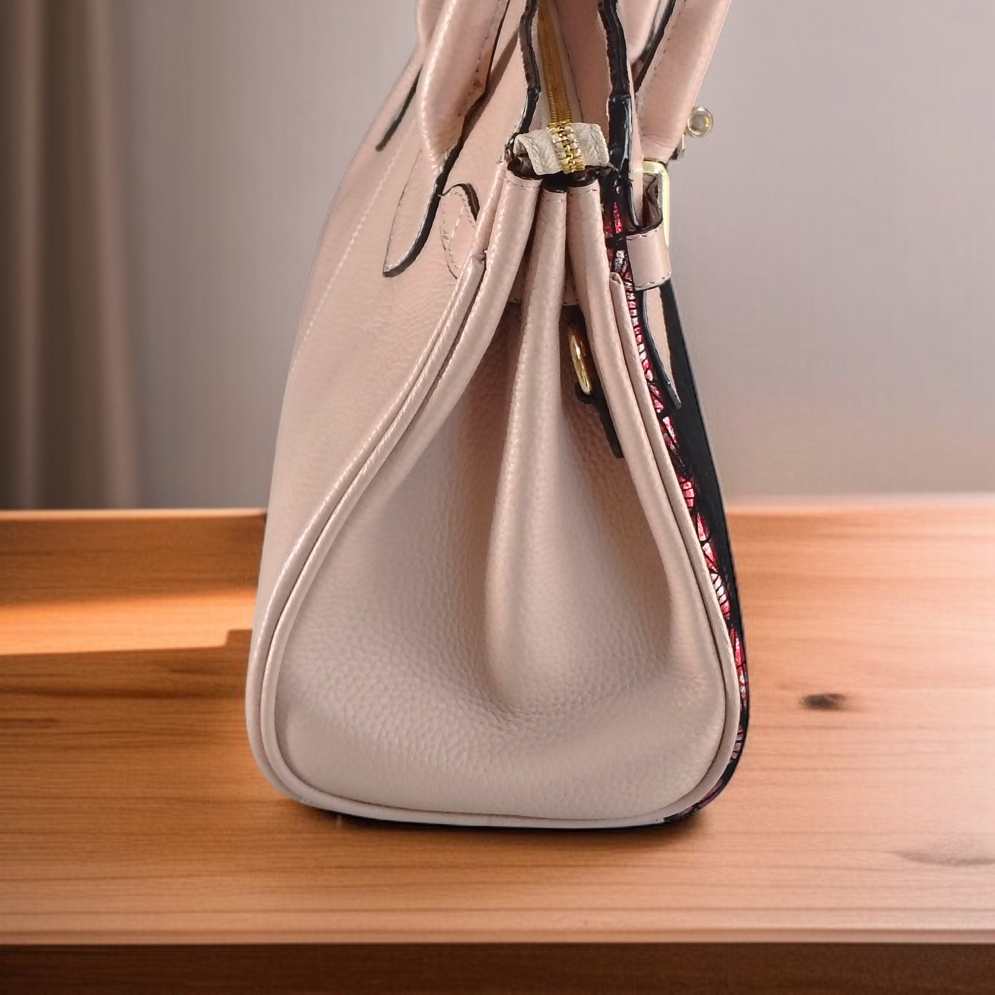 Riya Printed leather handbag